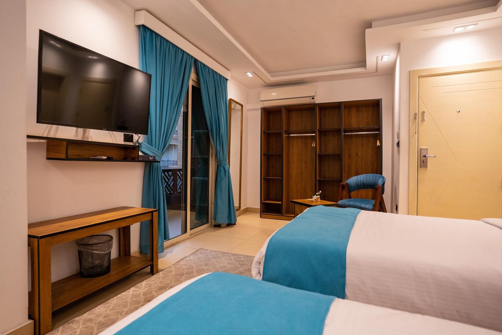Pyramids Gem Plaza Hotel Kafret el-Gabal Exterior foto